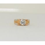 An 18ct yellow gold gents Rolex style ring the central stone of 1.55cts. Size P