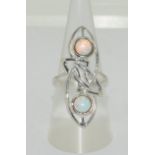 A silver art nouveau style ring with two opal panels. Size P