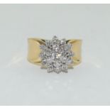 An 18ct yellow gold impressive diamond cluster ring of 1.1cts