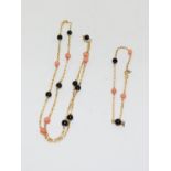 9ct gold matching necklace and bracelet with matching coral and lapiz decoration