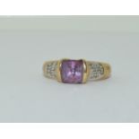 A chunky amethyst and diamond 9ct gold ring, Size P 1/2.