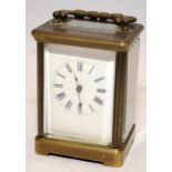 Vintage small brass carriage clock. Seen working. Ref 35