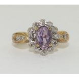 9ct gold ladies Amethyst and diamond chip cluster ring size J