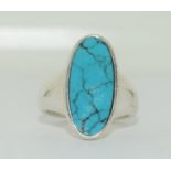 A turquoise and 925 silver ring Size K