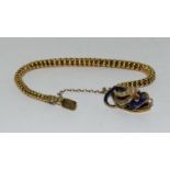 Chinese Snake enamel and pearl bracelet with diamonds on neck.