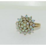 A Fire opal cluster heavy 4g 9ct gold ring, Size S