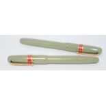 Pair of Swan self fill 312 fountain pens in pastel green. Factory sleeves still attached poss NOS.