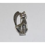 Vintage silver marcasite cat brooch with garnet eyes.