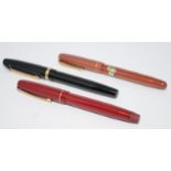 Three vintage Swan fountain pens to include a leverless black model c/w Swan H No.3 14ct nib, a