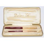 Parker P51 fountain pen and propelling pencil set in burgundy and custom rolled gold. Both chalk