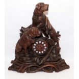Large Black Forest carved Mantle clock, late 19th century the case carved with two St Bernard