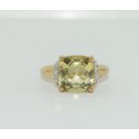 9ct gold ladies Peridot ring set with diamond shoulders size N