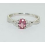 A Pink sapphire diamond 18ct white gold ring Size N