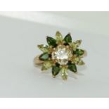 9ct gold ladies Peridot cluster ring set as a star burst size N