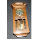 Antique medium oak long case Westminster striking wall clock. Serviced and working. Ref.8
