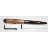 Vintage Eversharp Skyline fountain pen with brown stripe cap and Eversharp 14ct nib c/w a Pelikan