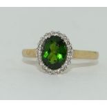 9ct gold ladies Emerald colour and Diamond halo style ring size N