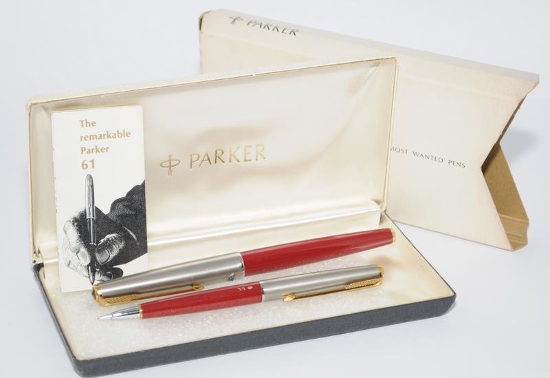 Parker 61 set in original box to include fountain pen and LL pencil with Rage Red body. 1st