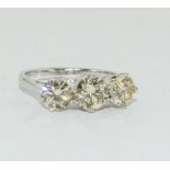 An 18ct three stone diamond ring of 2ct approx.size L