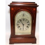 Vintage bracket clock in mahogany case with silvered dial supplied with key and pendulum. Seen