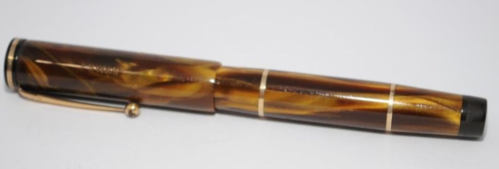 Top quality Swan L330/64 leverless fountain pen in amber/brown, fully restored at considerable