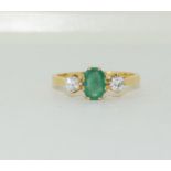 18ct gold ladies Emerald 0.75ct and Diamond 0.30ct ring size P