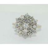 A Diamond cluster approx. 2.00 diamonds set in heavy 6.7g 18ct (tested) gold.