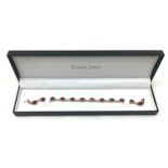 9ct gold 12 stone set ruby bracelet