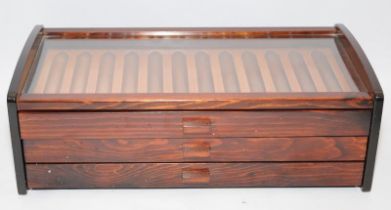 Quality pen storage/display case of wooden construction. Glass topped with three drawers capable