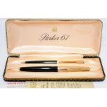 Parker 61 fountain pen and propelling pencil set, black body with gold plated cap. Near mint in