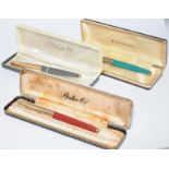 Three vintage boxed Parker fountain pens to include Parker 61 Series 1 in Rage Red with red and