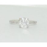 An 18ct white gold single stone diamond ring total weight 1.3cts. Size M