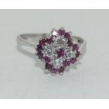 18ct white gold ladies diamond and ruby daisy ring size R