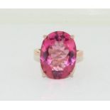 A large pink stone 925 silver gilt ring Size O.