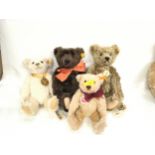 Collection of four Steiff bears with yellow tags: 000737, brass mohair, tilt growler, with chest tag