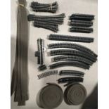 130+ pieces of OO gauge Hornby and Peco track to include various lengths of curves, straights,