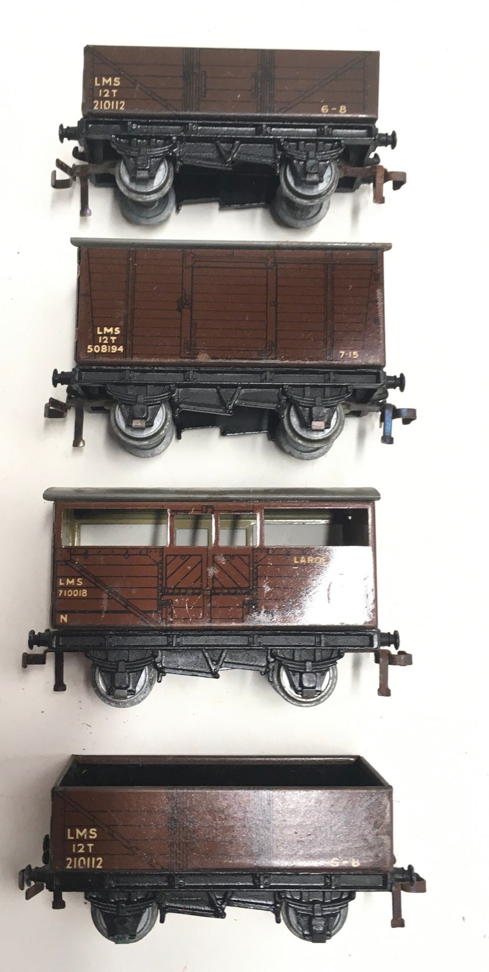 4 Hornby Dublo freight wagons - 2 x D1 Open, 1 x D1 Goods Van, 1 x D1 Cattle Truck. In Good