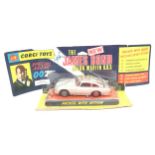 Corgi 270 "James Bond" Aston Martin DB5 - silver, red interior and tyre slashers, chrome front and