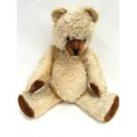 Large vintage Schuco Teddy Bear with blonde mohair, jointed with growler.