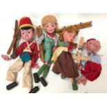 Four Pelham Puppets to include Bom Toy Soldier by Enid Blyton, Hansel, Gretel and Pinky Pig.
