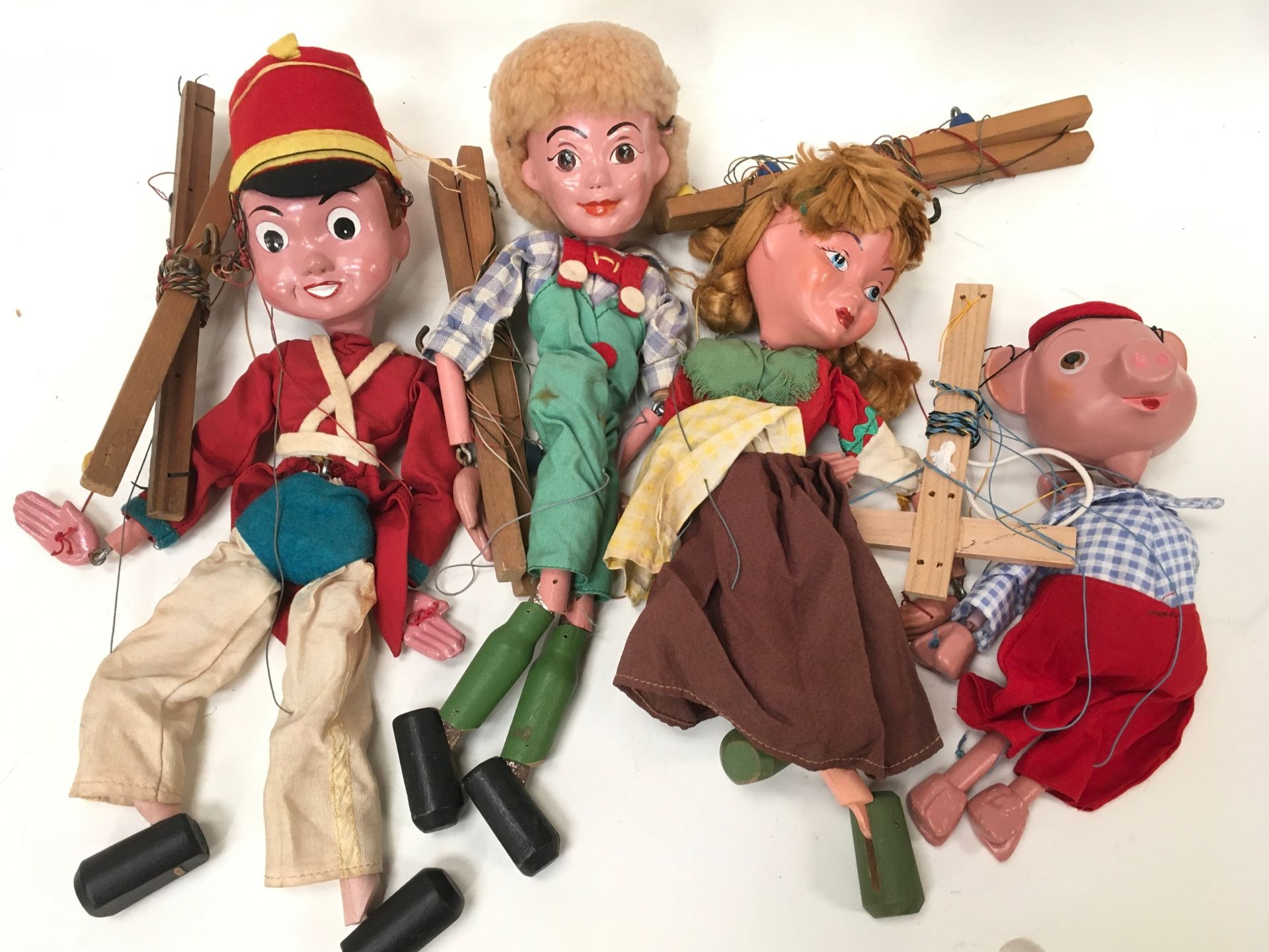 Four Pelham Puppets to include Bom Toy Soldier by Enid Blyton, Hansel, Gretel and Pinky Pig.