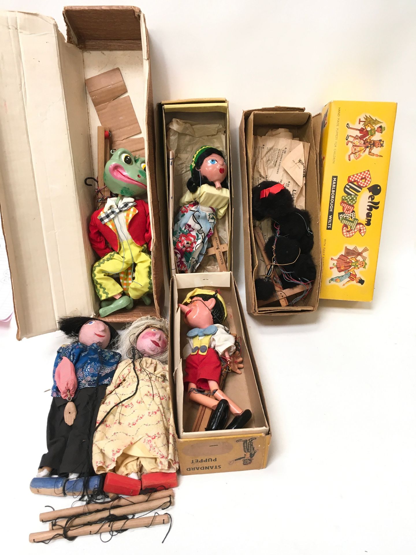Four Pelham puppets and two other to include Frog, Mexican Girl, Poodle and Pinocchio together