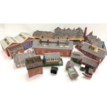 Box containing multiple card buildings including large station, large engine shed, factory, water