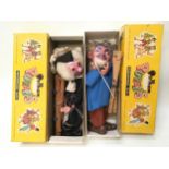 Pair of Pelham Puppets: SL27 Old Man and SM School Master in correct yellow carded boxes.