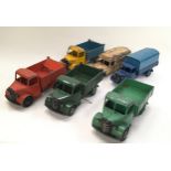 Dinky unboxed group to include 3 x 410 Bedford End Tippers - Burnt Orange/Yellow and Blue/Green, 411