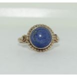 A 925 silver and blue stone ring, Size P 1/2.