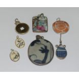 Collection of Chinese silver pendants.