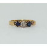 18ct gold ladies Diamond and sapphire 3 stone ring size O