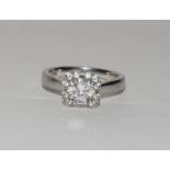 A pretty CZ and silver 925 ring, Size Q