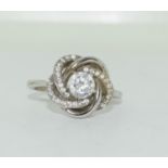 A sterling silver 925 and CZ flower ring, Size L1/2.